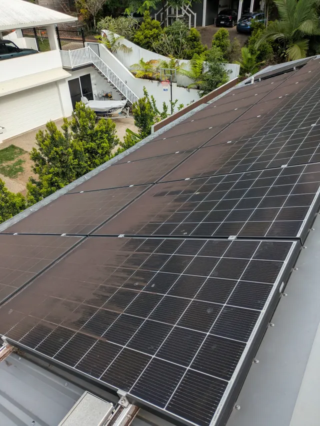 Solar panels covered in dirt and grime before cleaning